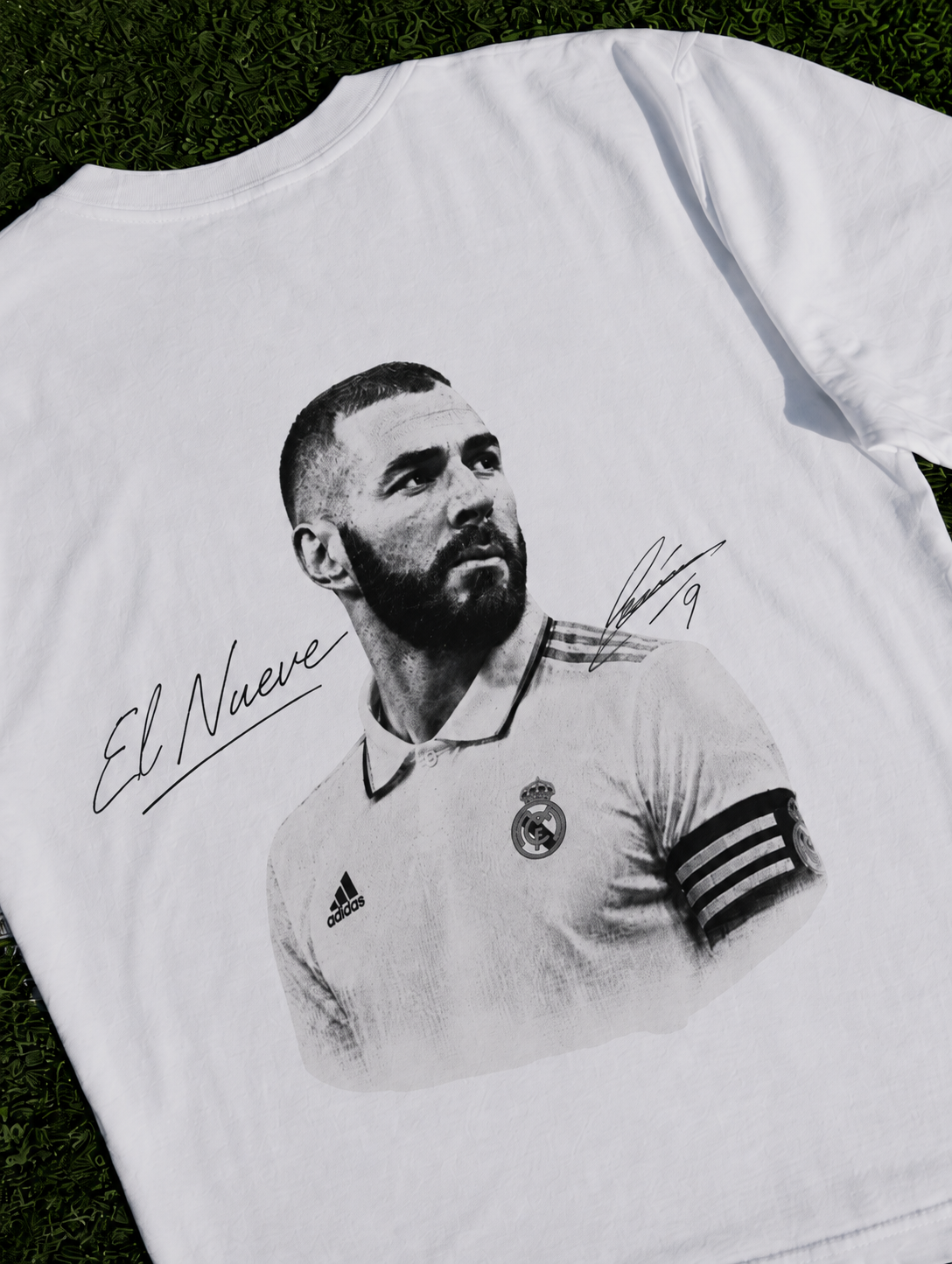 Karim Benzema El Nueve organic heavy white football T-shirt on a football pitch zoomed in