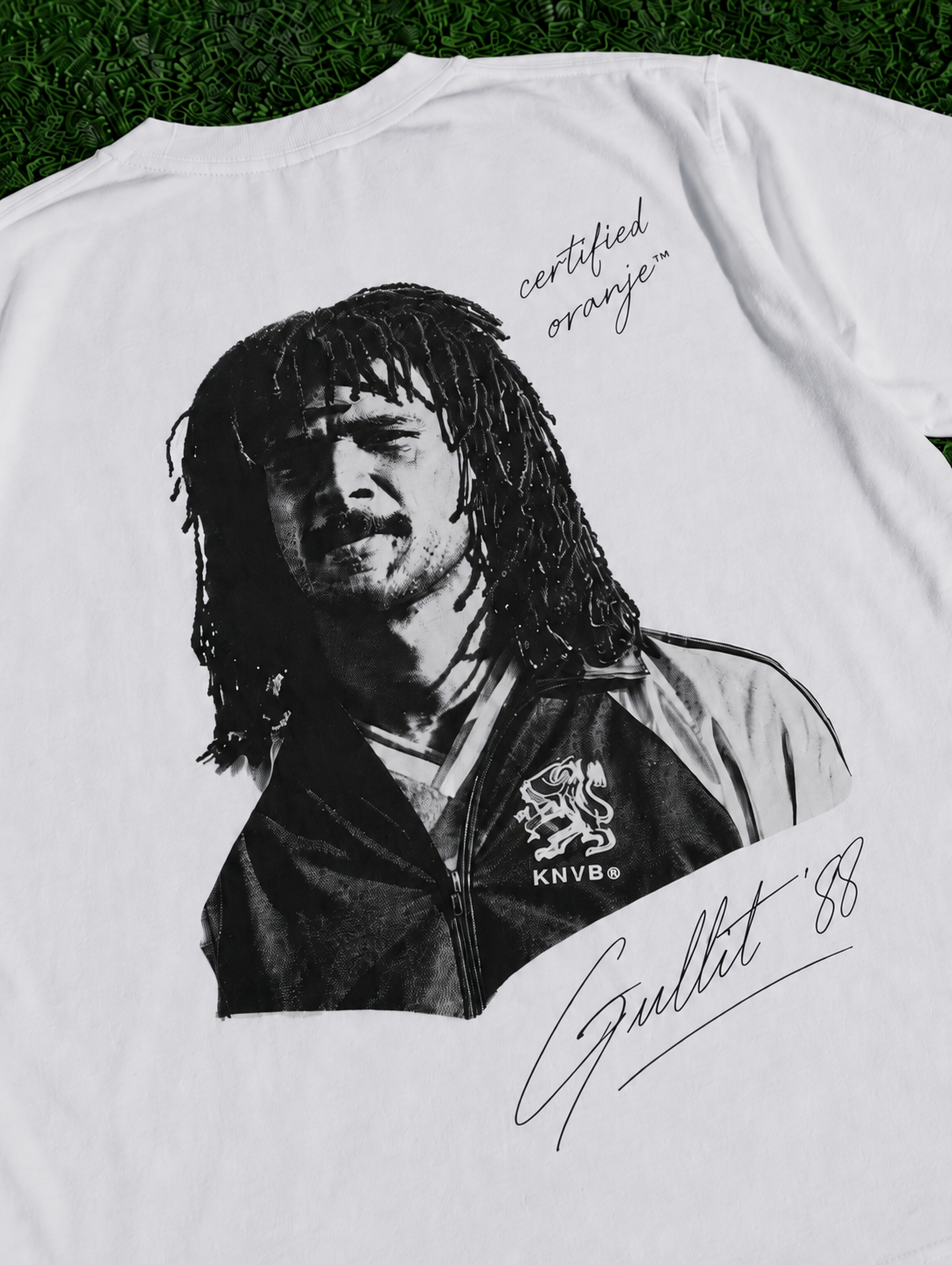 White Gullit Signature Tee with monochrome Ruud Gullit portrait, signature graphic and Certified Orange detail zoomed in