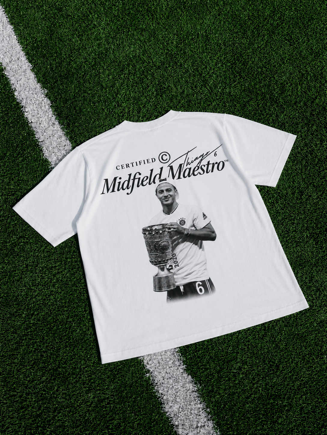 Thiago Midfield Maestro organic heavy white football T-shirt on a football pitch